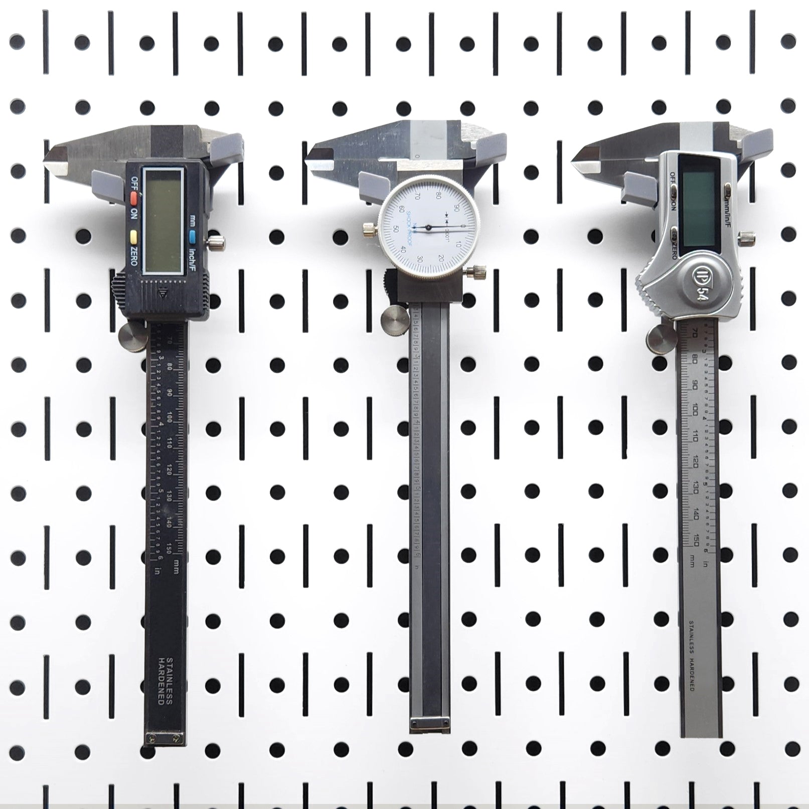 TROPEKβ’ 116 Brackets showing secure placement of calipers on a pegboard.